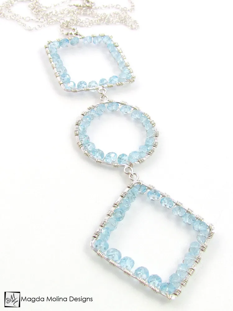 Long Geometric Silver Necklace With Blue Topaz Gemstones