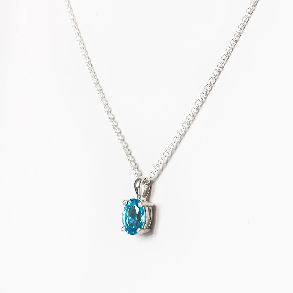 Luna, an Oval cut Swiss Blue Topaz Necklace - 7x5mm