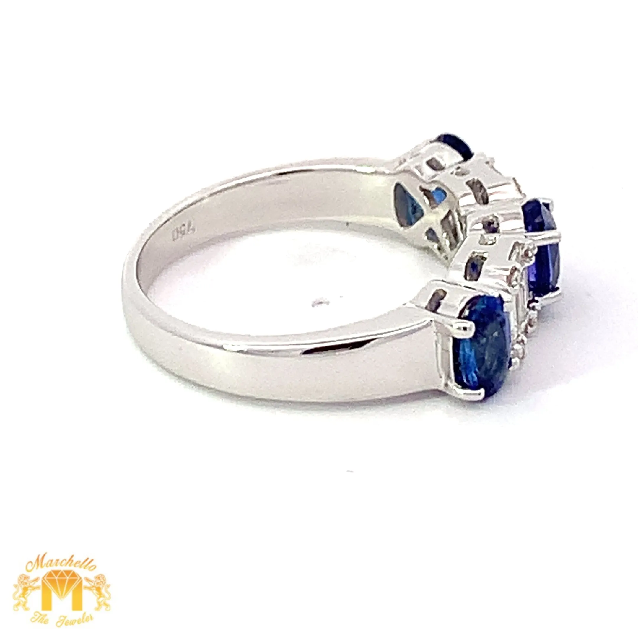 VVS/vs EF color high clarity diamonds set in a 18k Gold Celine Blue Sapphire Ring with Baguette Diamonds