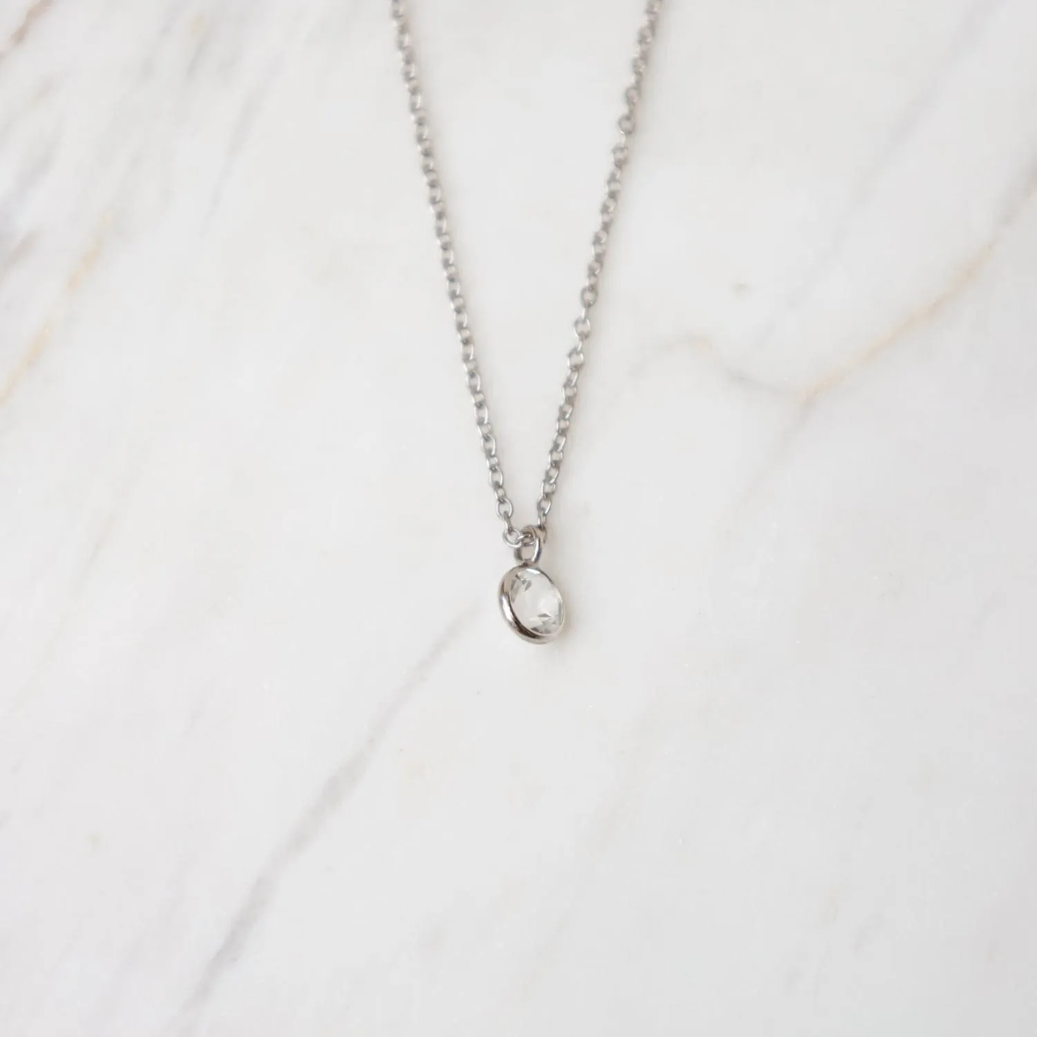 White Gold & White Topaz Solitaire Necklace